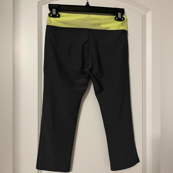 Under Armour cropped leggings, size small. Black with neon yellow waist … - Picture 2 of 5